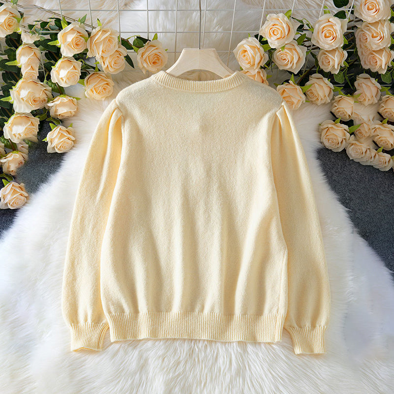 JOUDIE, Pull style veste boutonnée.