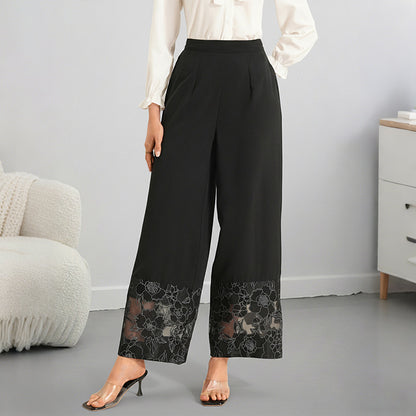 SERFI Pantalon droite avec panneaux de dentelle transparente.
