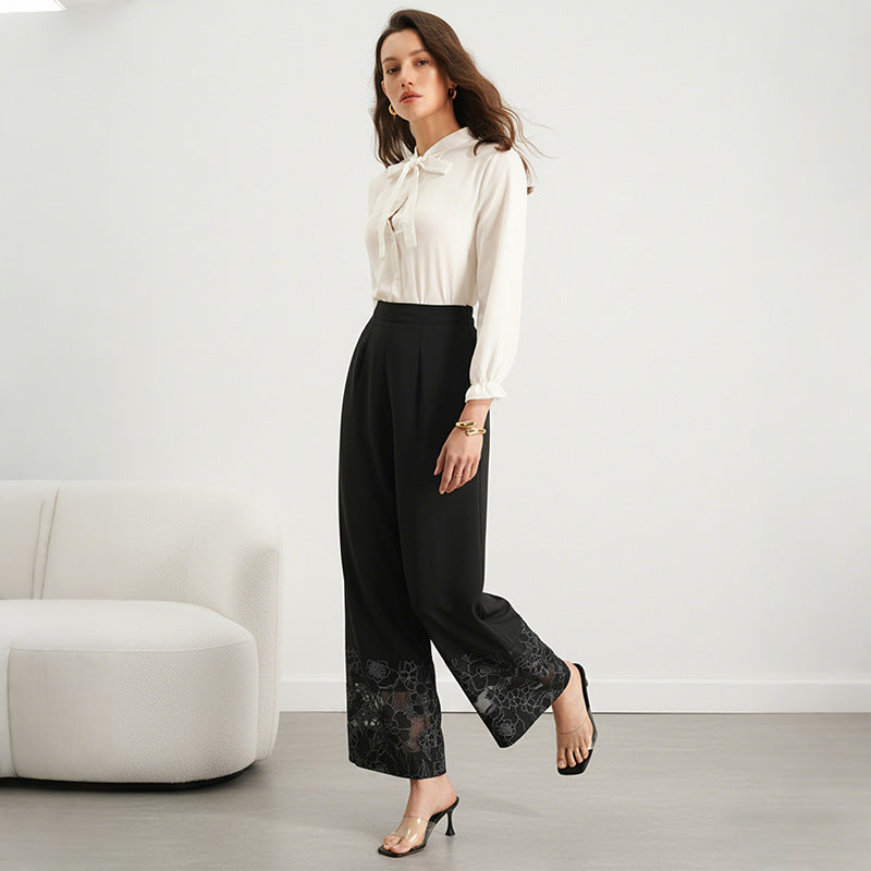 SERFI Pantalon droite avec panneaux de dentelle transparente.
