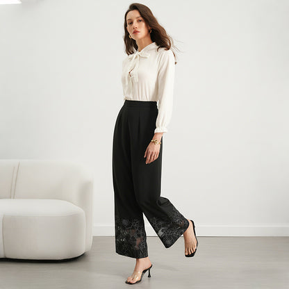 SERFI Pantalon droite avec panneaux de dentelle transparente.
