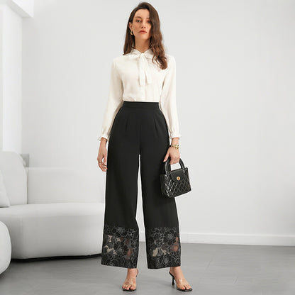 SERFI Pantalon droite avec panneaux de dentelle transparente.